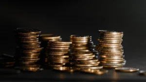 Stacks of coins representing investment growth in China and the US.