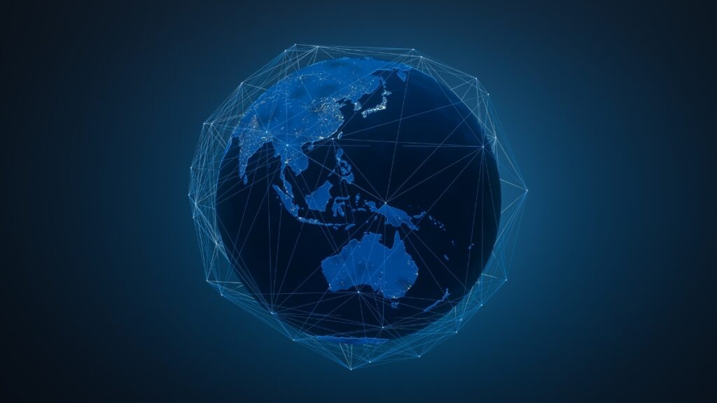 Blue digital globe with interconnected lines outlining continents, symbolizing global networking.