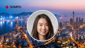 SOMPO logo on a nighttime city skyline with a circular portrait of a smiling woman in the foreground