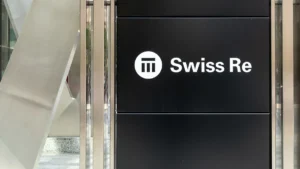 Swiss Re logo at the company's office building in Zurich, Switzerland.