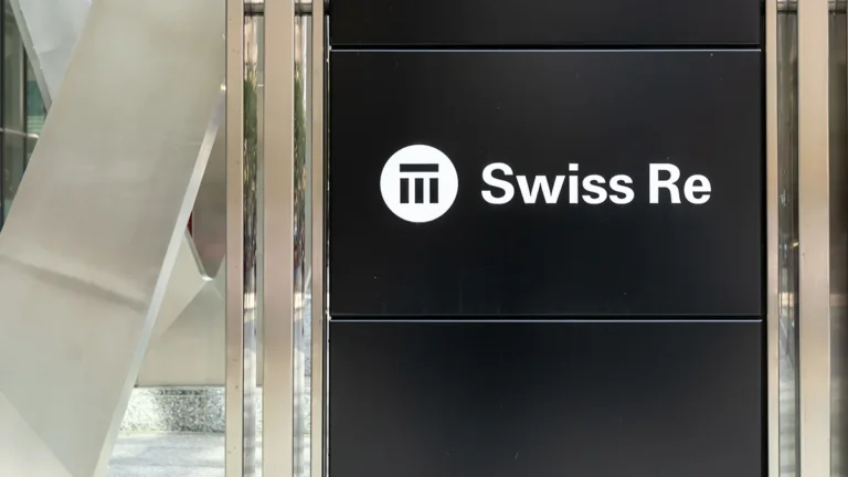 Swiss Re logo at the company's office building in Zurich, Switzerland.