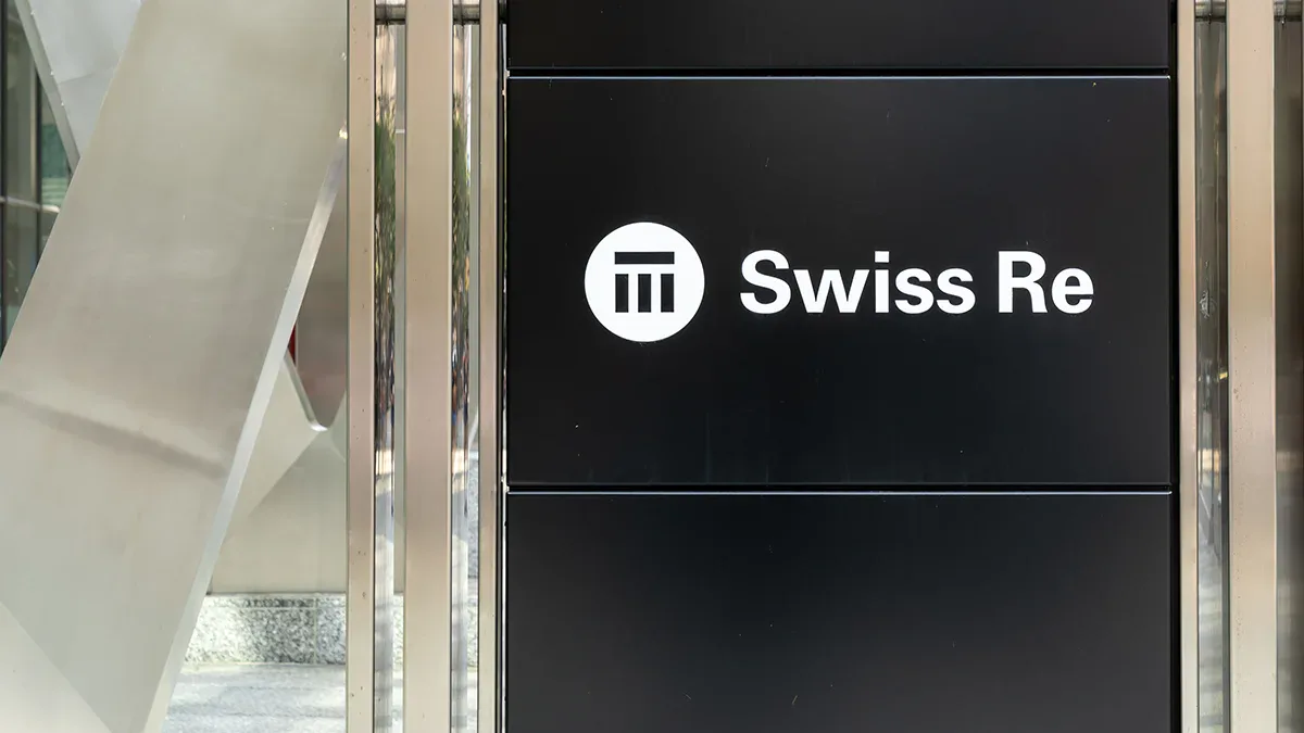 Swiss Re logo at the company's office building in Zurich, Switzerland.