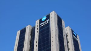 Woori Bank building in South Korea with blue sky background.