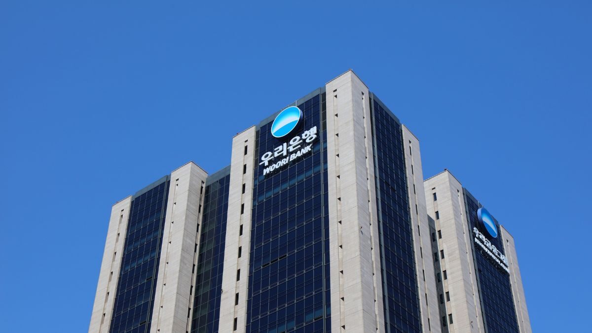 Woori Bank building in South Korea with blue sky background.