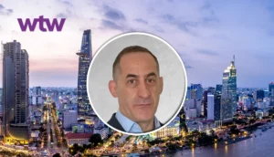 Andrew Morgan, new leader for expatriate and high-end medical in Asia Pacific, in front of a citysky.
