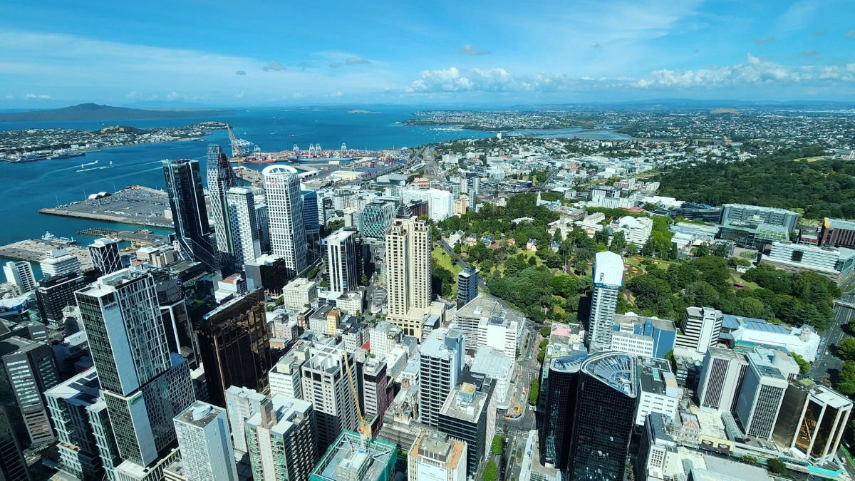 Aerial view of Auckland city skyline, New Zealand, with skyscrapers and harbour.