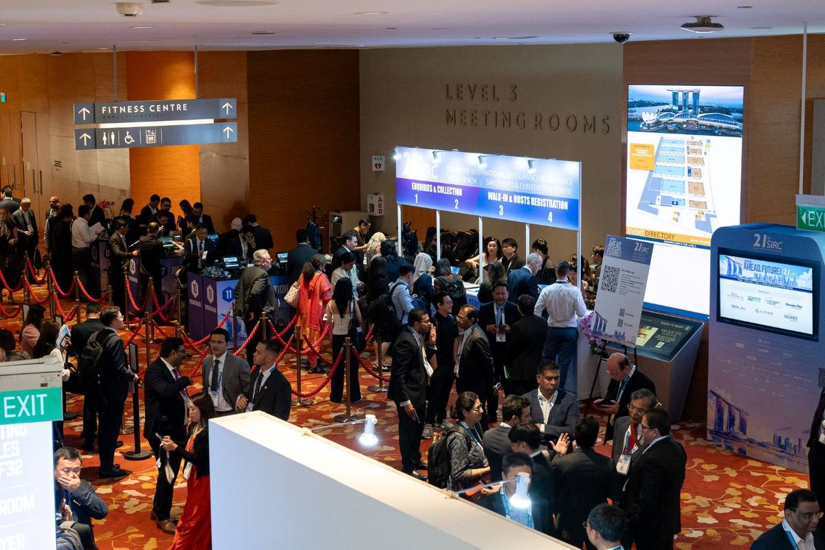 Delegates at the registration desks on the SIRC conference floor at Sands Expo & Convention Centre