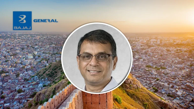 Deepak Reddy, incoming MD and CEO of Bajaj General Insurance, pictured over a cityscape with the company logo.