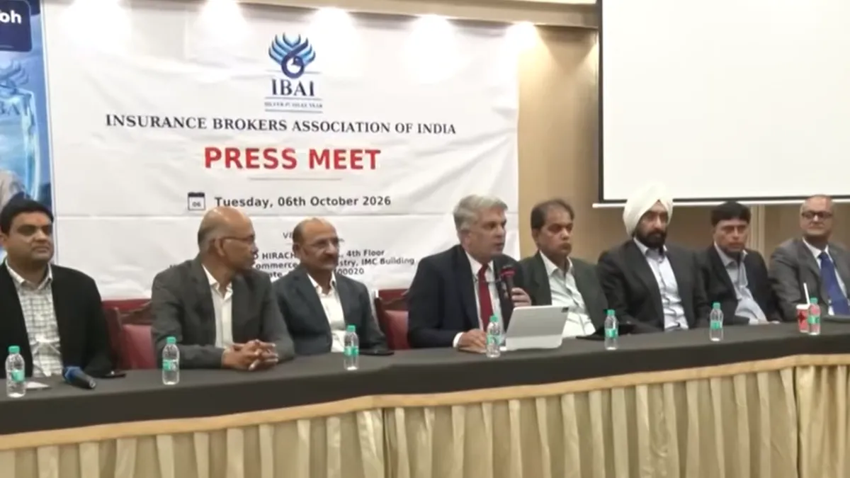 Insurance Brokers Association of India press meet with panelists seated at a table.