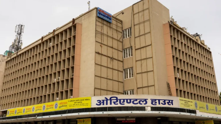 Exterior of Oriental House, a multi-storey building bearing Oriental Insurance signage.