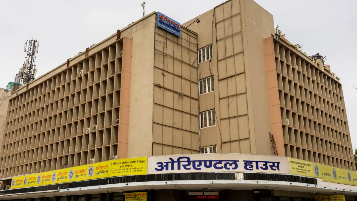 Exterior of Oriental House, a multi-storey building bearing Oriental Insurance signage.
