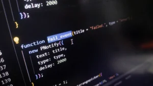 Computer screen displaying PHP code for a failure notification function.