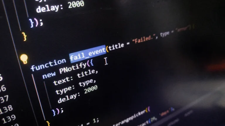 Computer screen displaying PHP code for a failure notification function.
