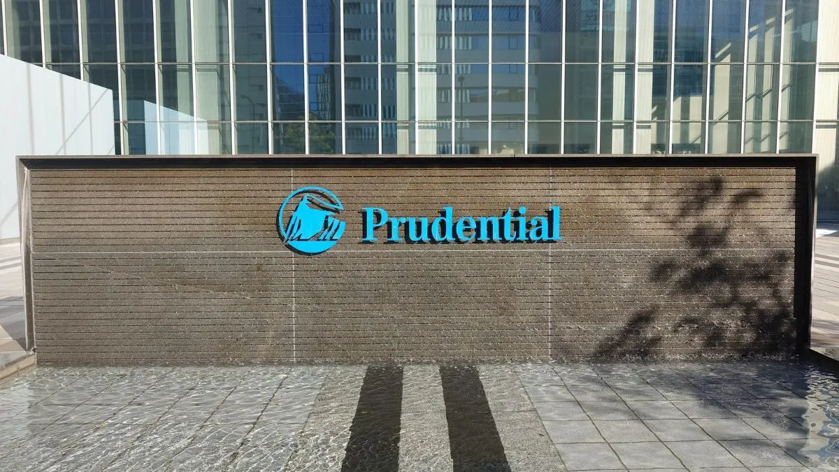 Prudential logo on a water feature outside a modern office building.