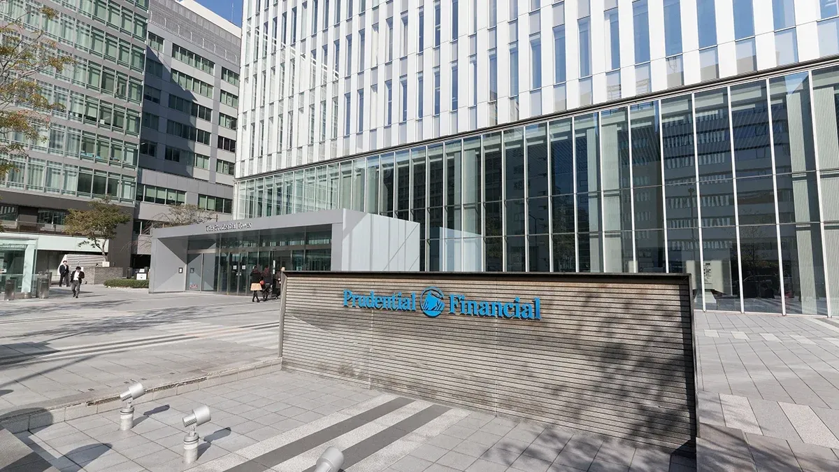 Prudential Financial office building exterior with the company logo in a paved plaza.