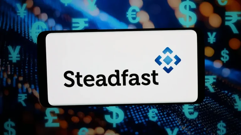 Steadfast logo and name displayed on a sign against a background of global currency symbols.