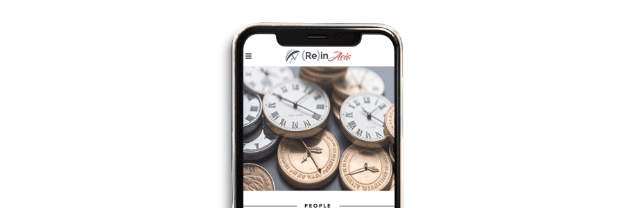 Photo of iPhone showing (Re)in Asia website with clocks that are shaped like coins.